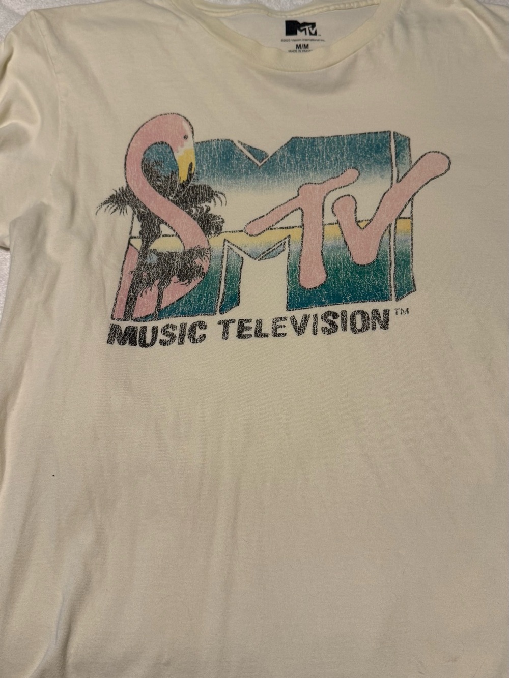 MTV Cream Tee with Pink Flamingo and Teal Gradient Logo